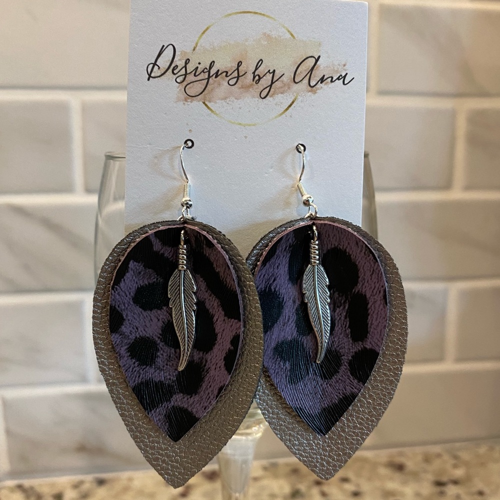 Super cute purple cheetah faux leather earrings! 💜